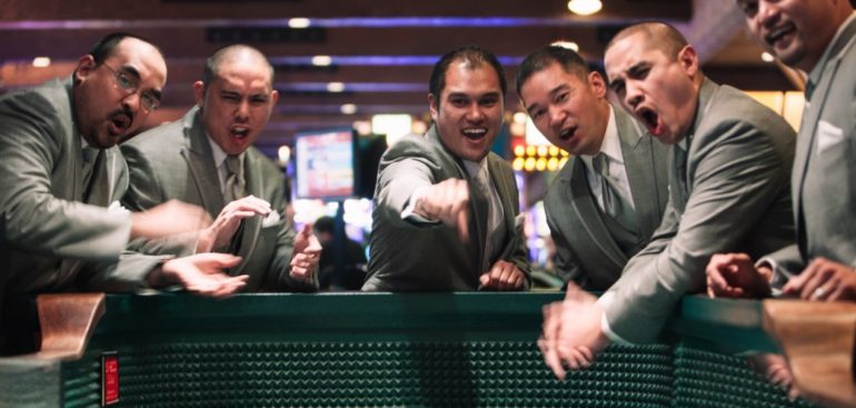 men gambling at a casino